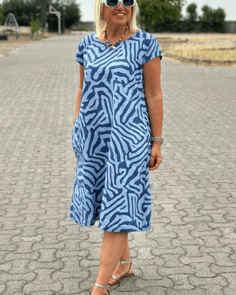 Nelia™ - Summer dress with a round neck and a beautiful print